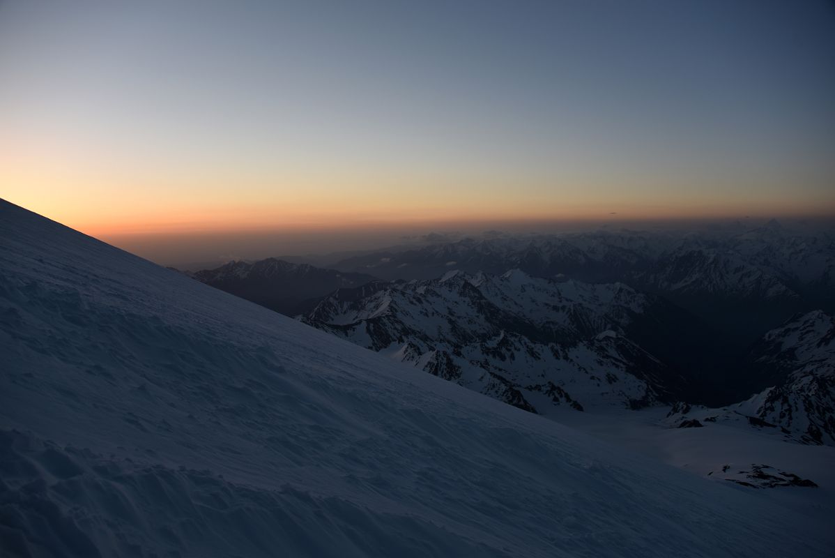 02B Orange Glow Just Before Sunrise With Mountains To The East From Mount Elbrus Climb